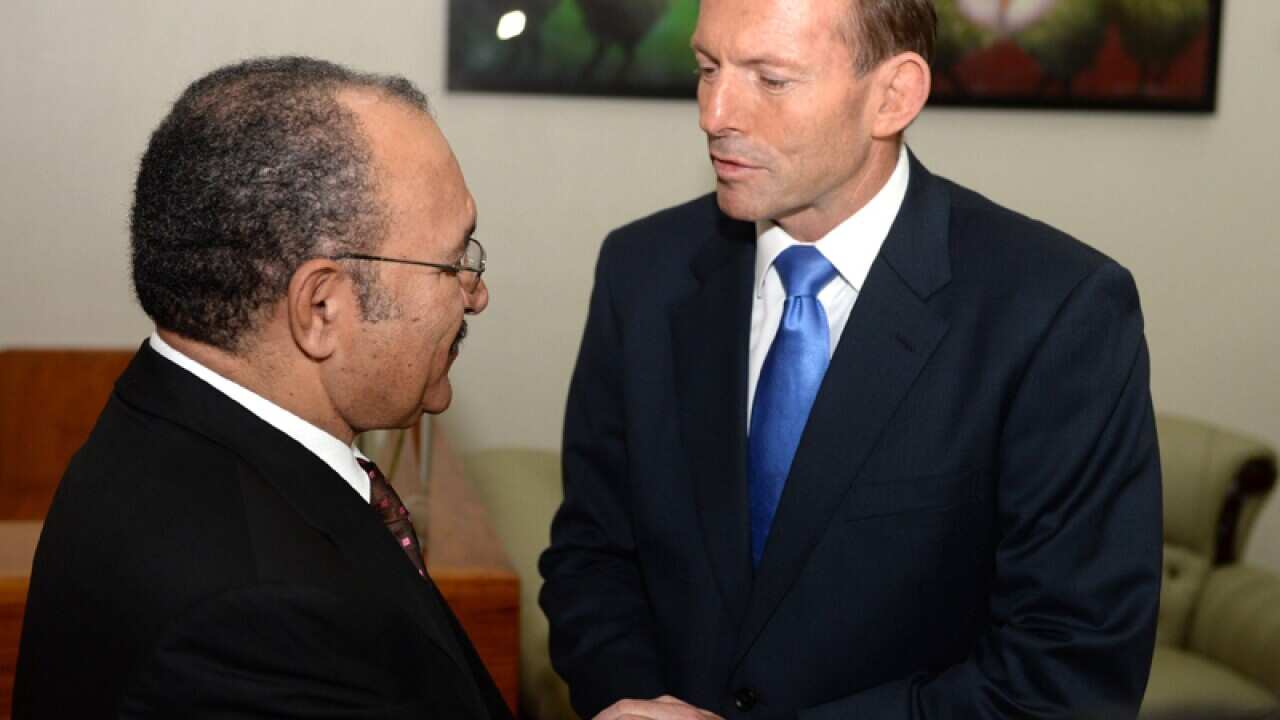 PNG prime minister Peter O'Neill greets Prime Minister Tony Abbott
