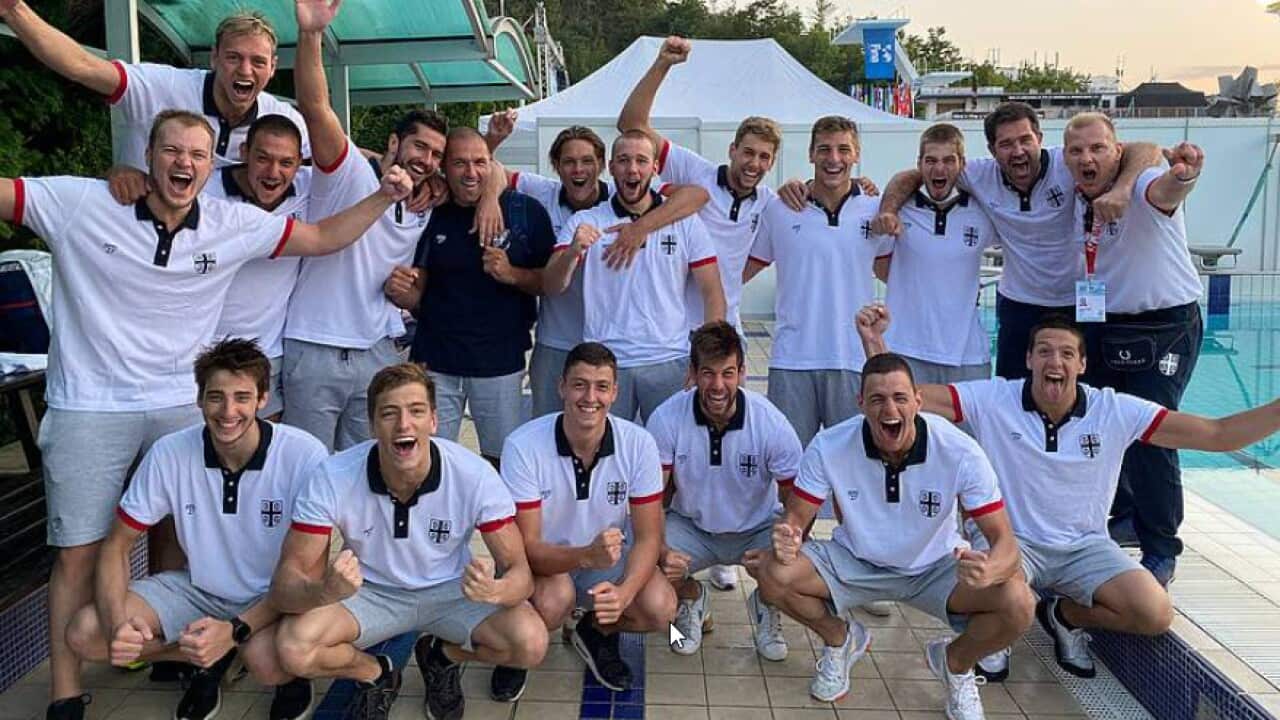 Serbia's national team celebrates after winning gold medal at the U20 Water Polo World championship.