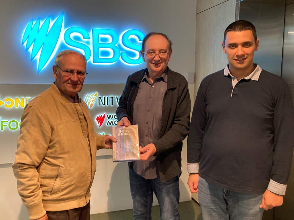 Joe M Attard presenting a copy of his book to J Axiaq with Francesco Pio 2.jpg