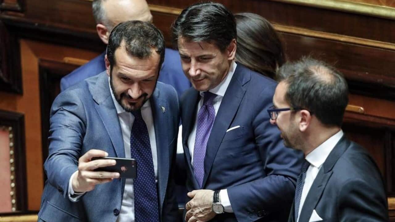 Italian senators pose with Prime MInister Giuseppe Conte.