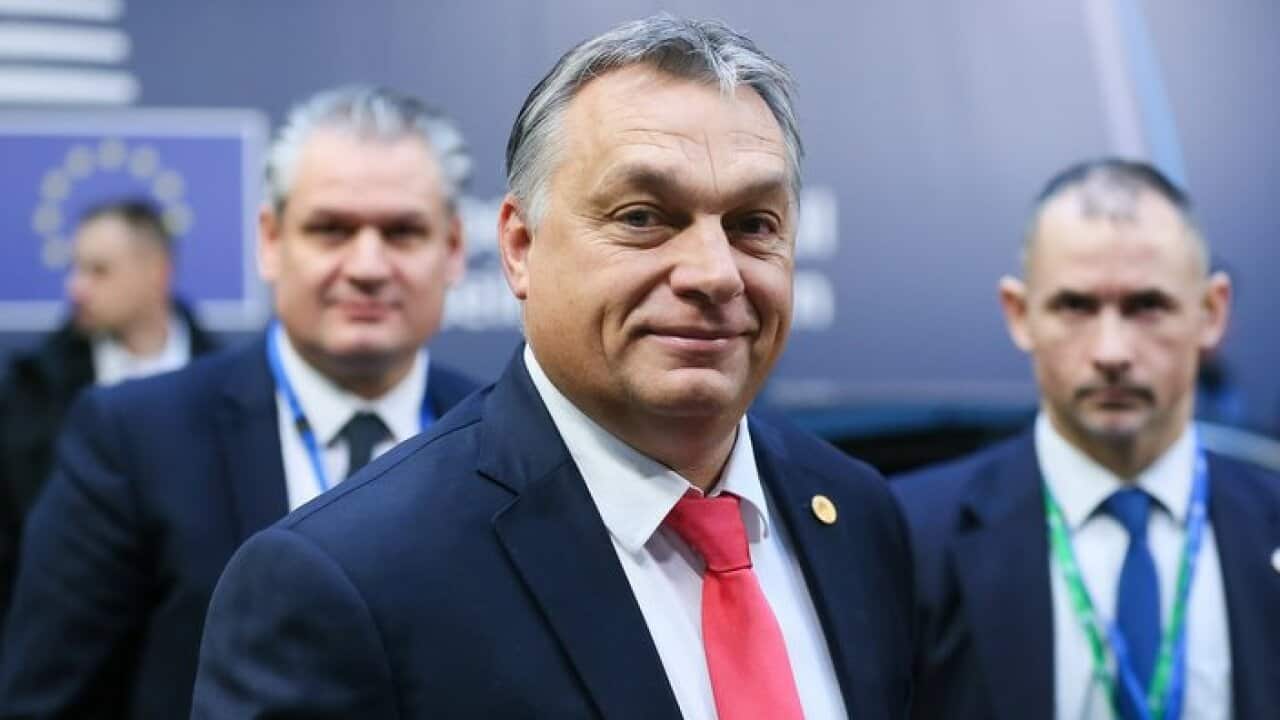 epa06390758 Hungarian Prime Minister Viktor Orban (C) arrives on the second day of the European Council meeting in Brussels, Belgium, 15 December 2017. EU leaders gather to discuss the most compelling matters in terms of migration, defense foreign affairs