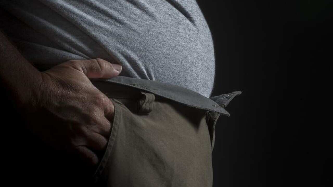 A file image of a close up of a man's waistline in Brisbane.