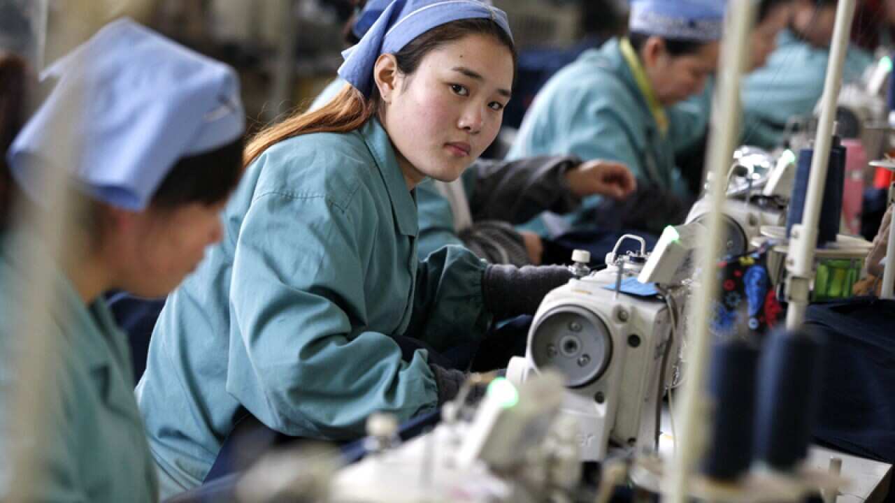 Workers at a garment factory in Huaibei city