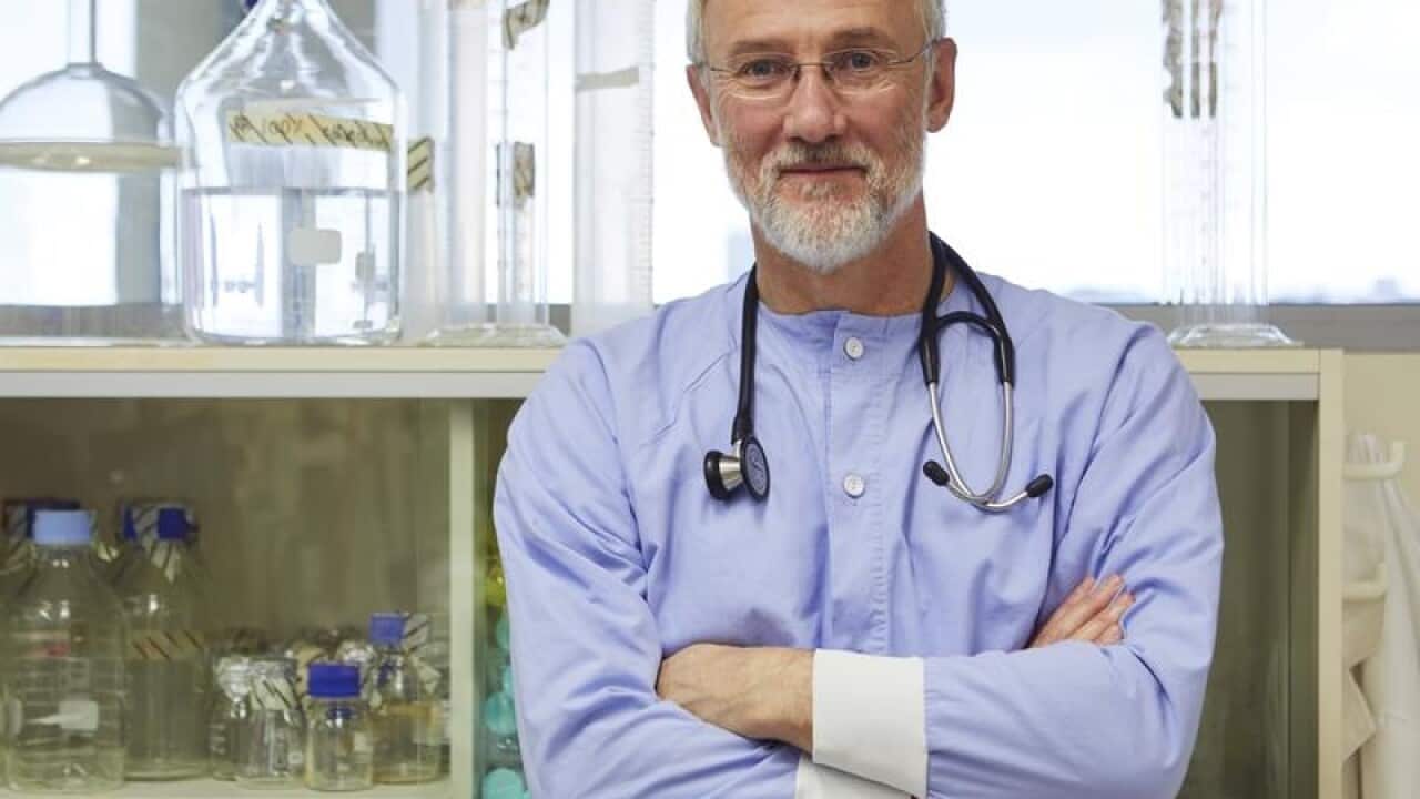 Professor Karlheinz Peter posing for a portrait in Melbourne.