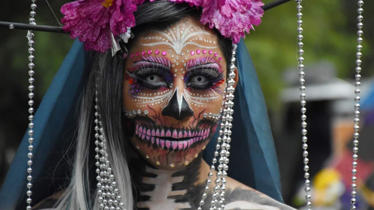 Participants dressed up to take part in the annual Dead of the Dead parade as part of traditional celebrations in Mexico City 