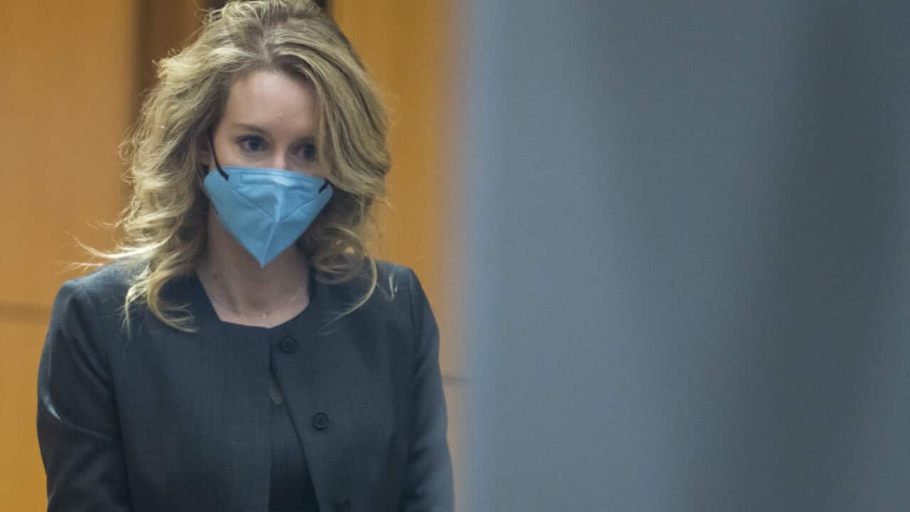 Elizabeth Holmes walks into federal court in San Jose, California on Monday, 3 January.