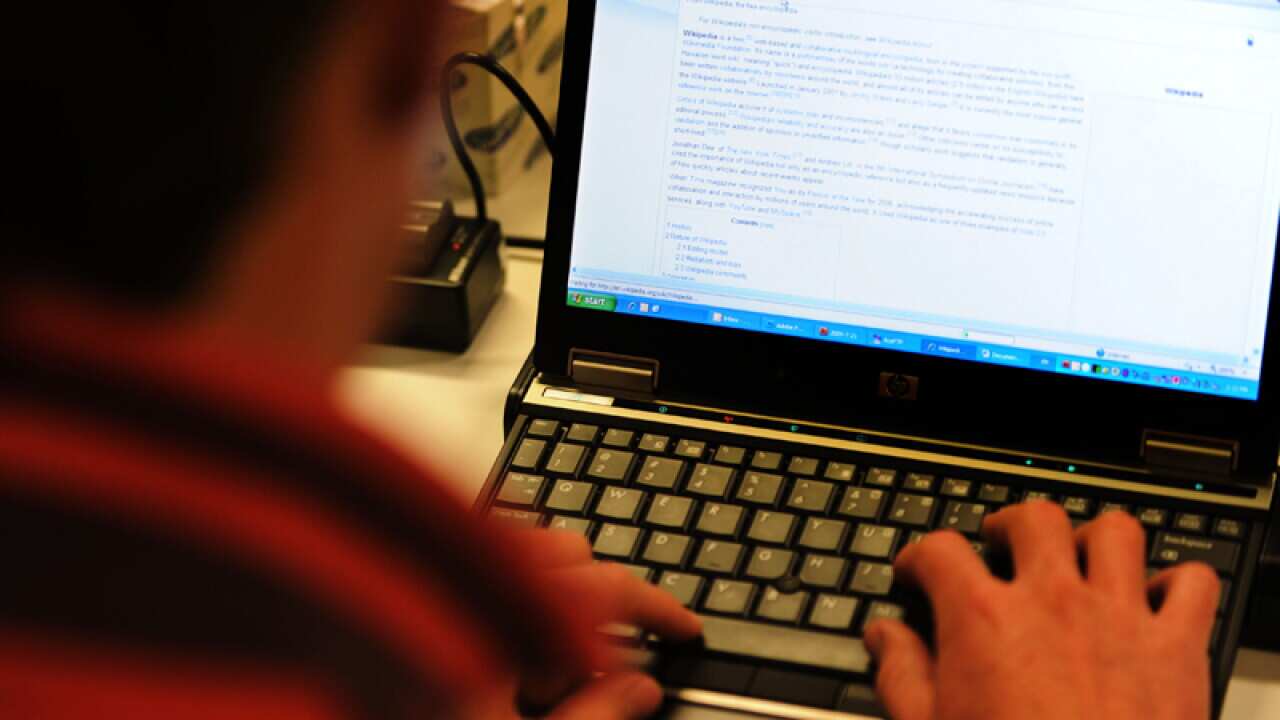 A man using a laptop