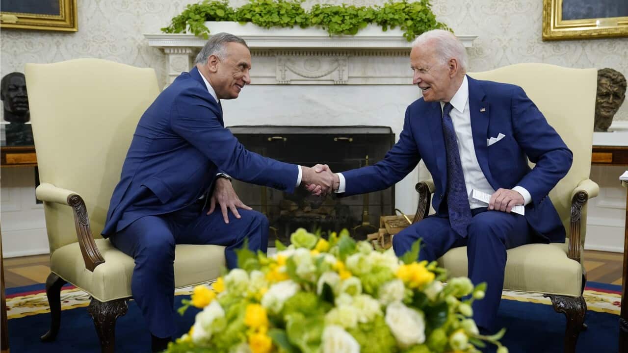 President Joe Biden (R) and Iraqi Prime Minister Mustafa al-Kadhimi