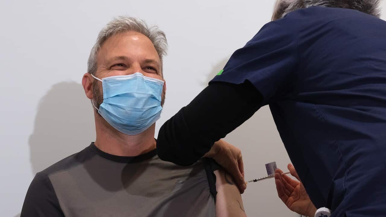 Victorian Chief Health Officer Brett Sutton receives his first COVID-19 vaccination at the Royal Exhibition Building in Melbourne, Wednesday, 21 April, 2021.
