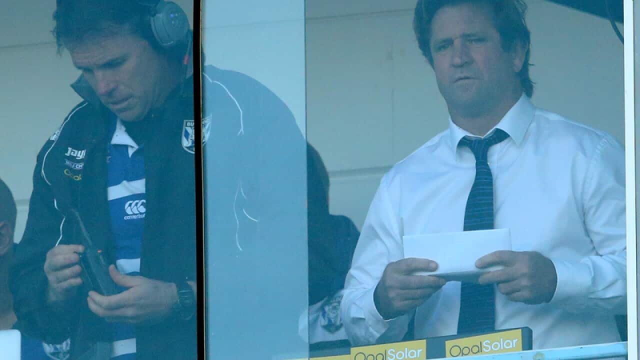 Bulldogs coach Des Hasler (right)