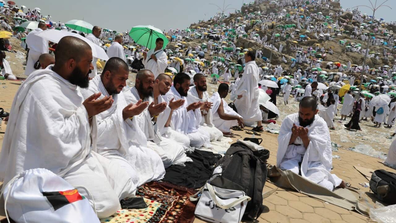 Muslim pilgrims pray at Mount Arafat, also known as Jabal al-Rahma (Mount of Mercy), southeast of the Saudi holy city of Mecca