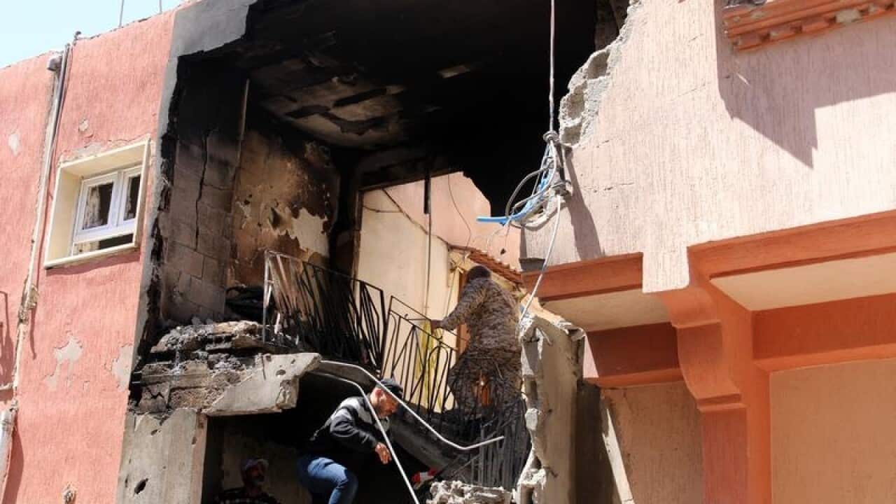 Buildings in Tripoli have been damaged by shelling