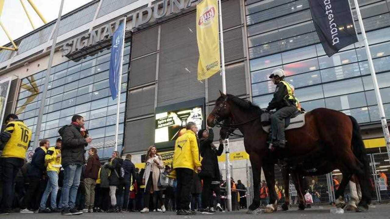 Mounted police patrol arround the stadium in Dortmund, Germany, 11 April 2017.