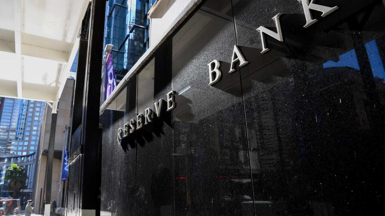 A pedestrian walks past the Reserve Bank of Australia (RBA) head office in Sydney, Tuesday, June 7, 2022. The Reserve Bank of Australia board holds its monthly meeting ahead of an announcement on interest rates. (AAP Image/Bianca De Marchi) NO ARCHIVING