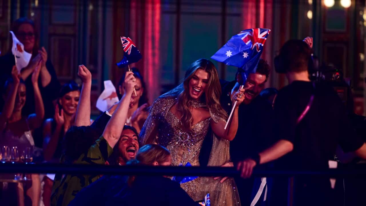 Singer Delta Goodrem among those waving flags during the second semi-final at Eurovision 2026.