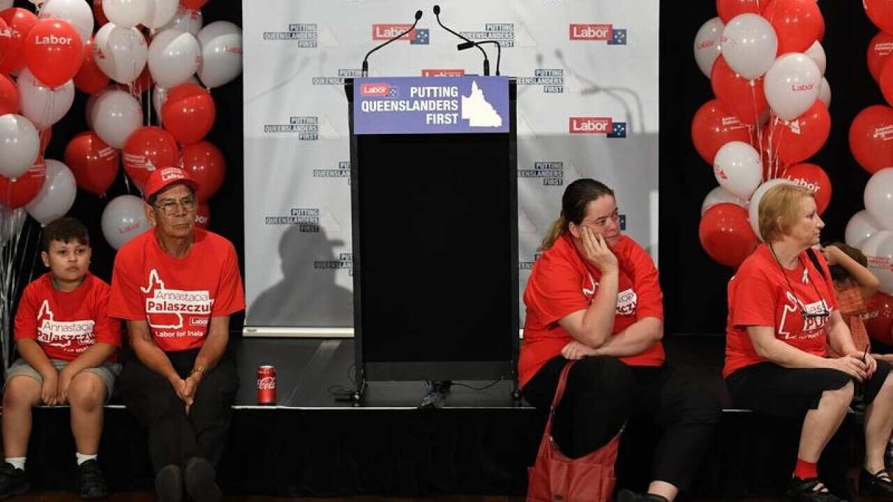 Labor supporters wait for Premier Annastacia Palaszczuk to arrive.