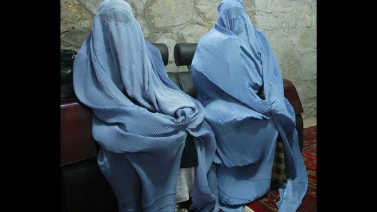 The burqa, or burka, is the most concealing of Islamic veils, covering the entire face and body with just a mesh screen to see through. (AAP)