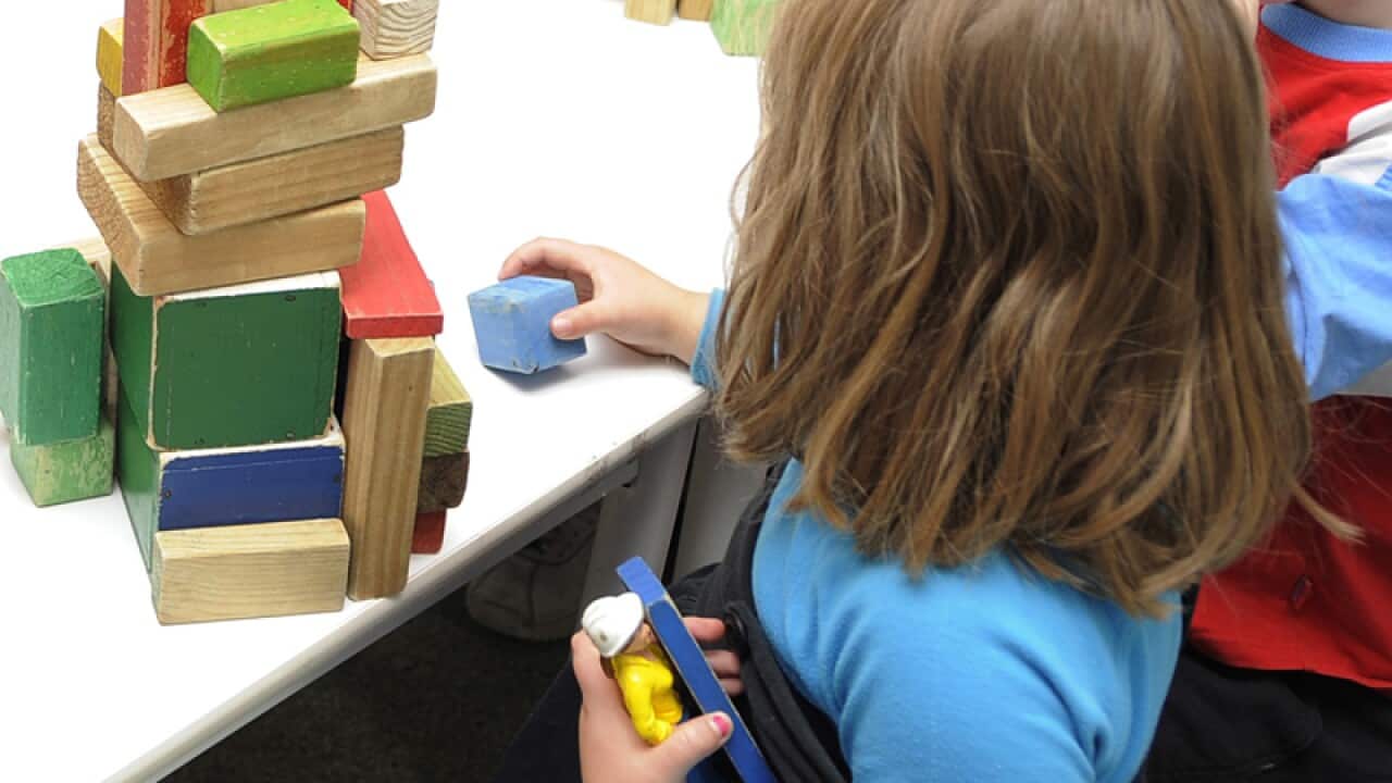 Children play with toys