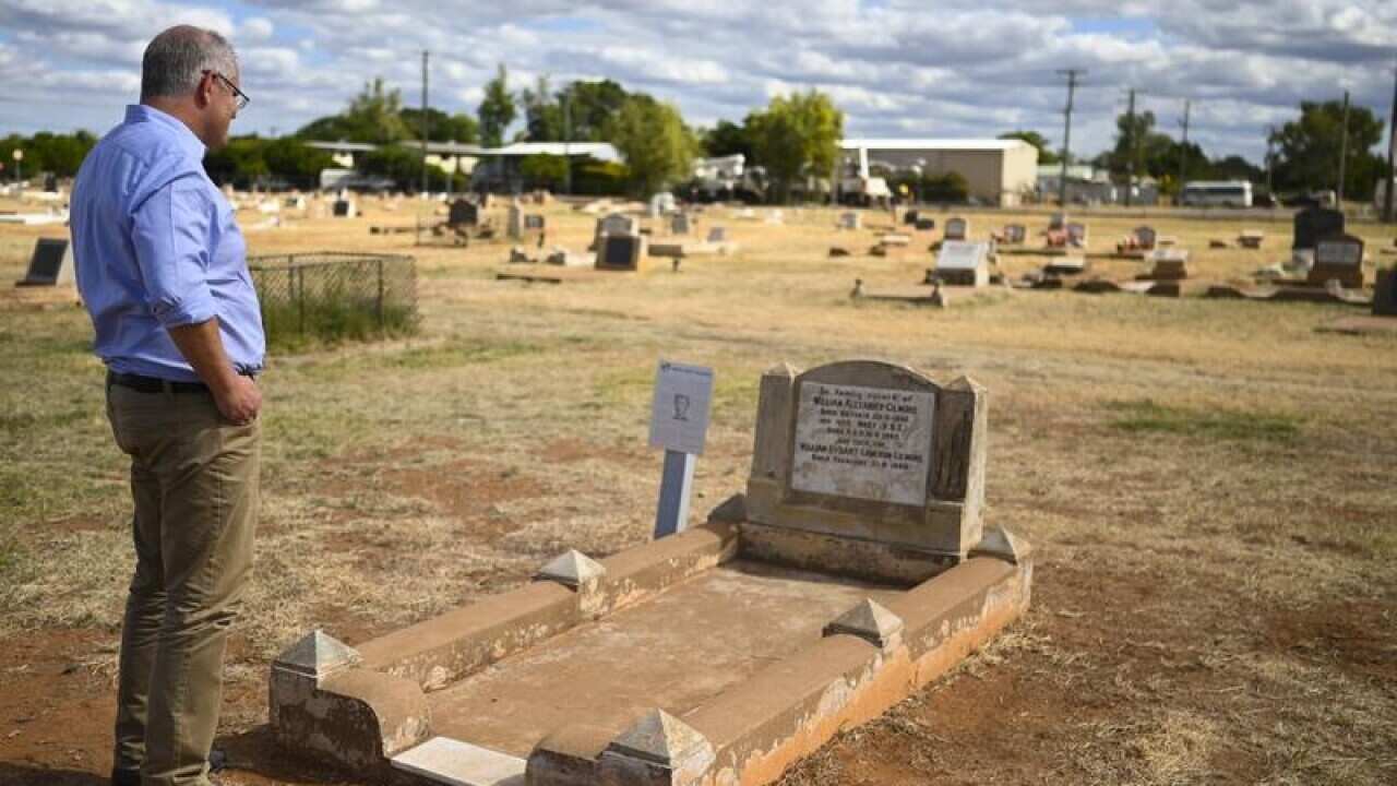 Scott Morrison at his great great aunt Dame Mary Gilmore's grave.