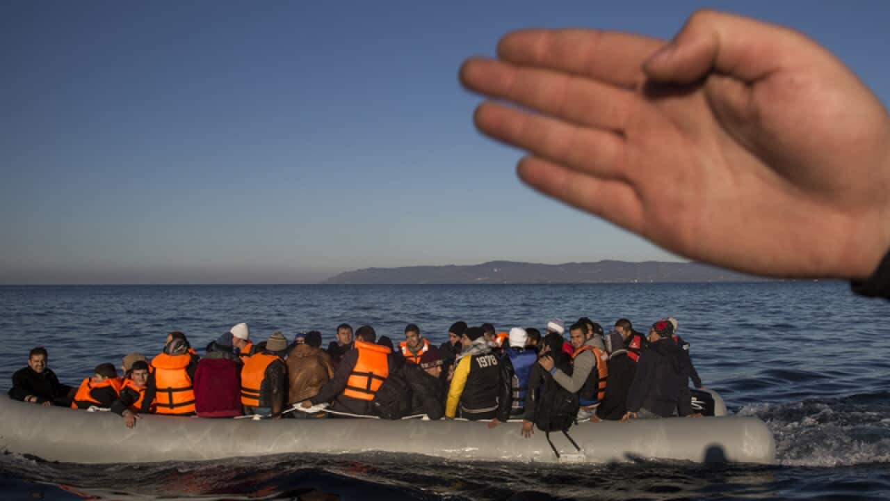 Refugees and migrants approach the Greek island of Lesbos