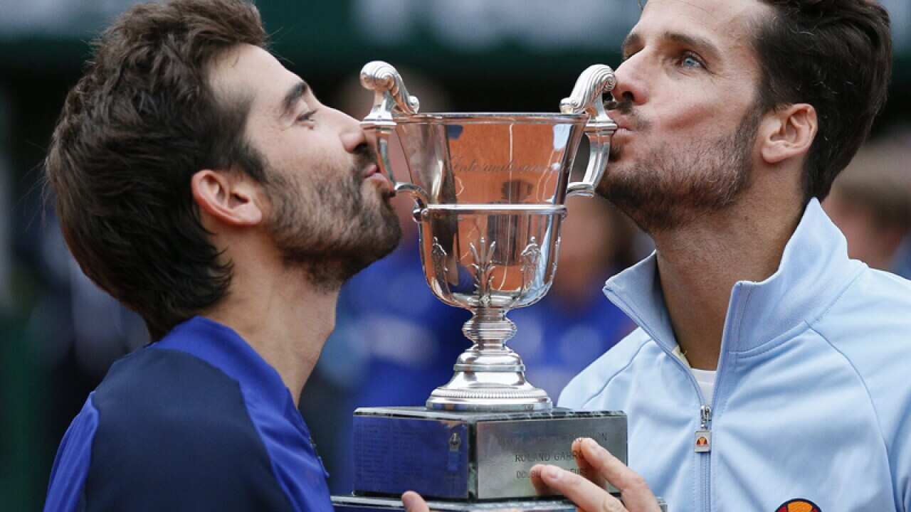 Feliciano Lopez (R) and Marc Lopez of Spain