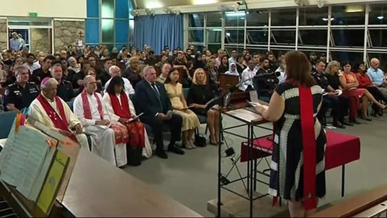 The vigil remembering the shooting victims at Darwin's central Uniting Church