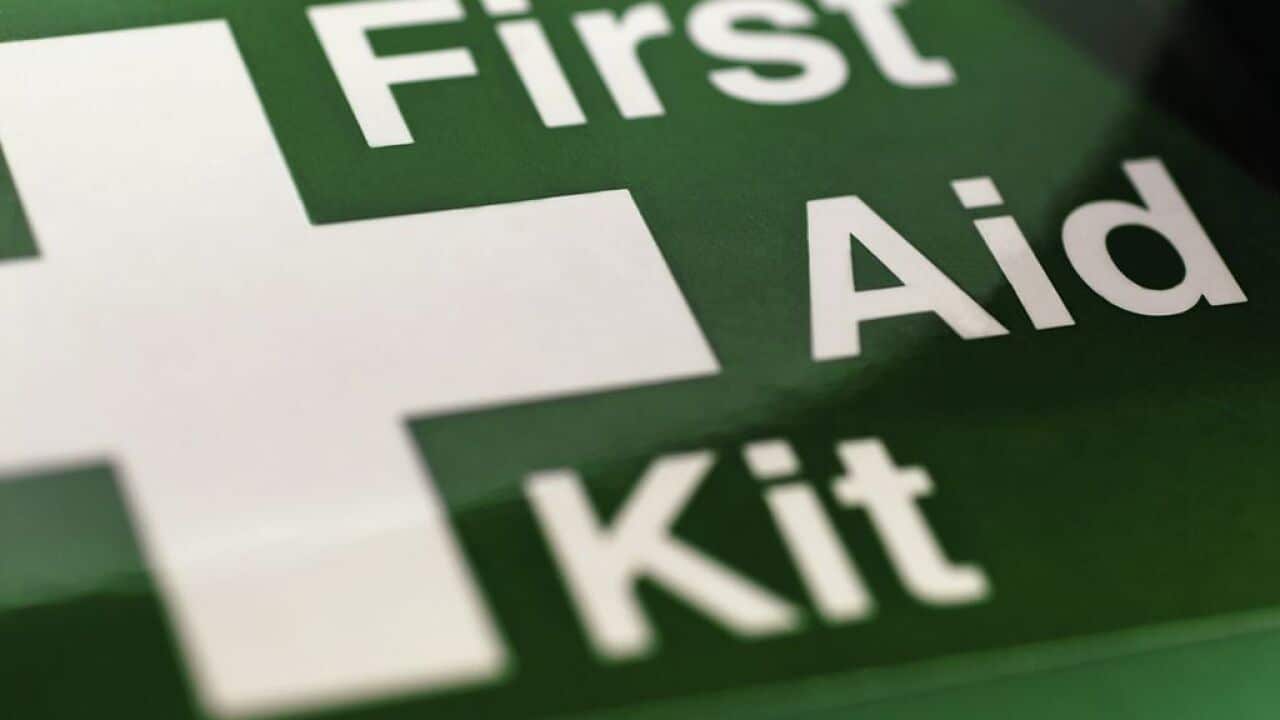 Close-up of first Aid Kit sign, UK