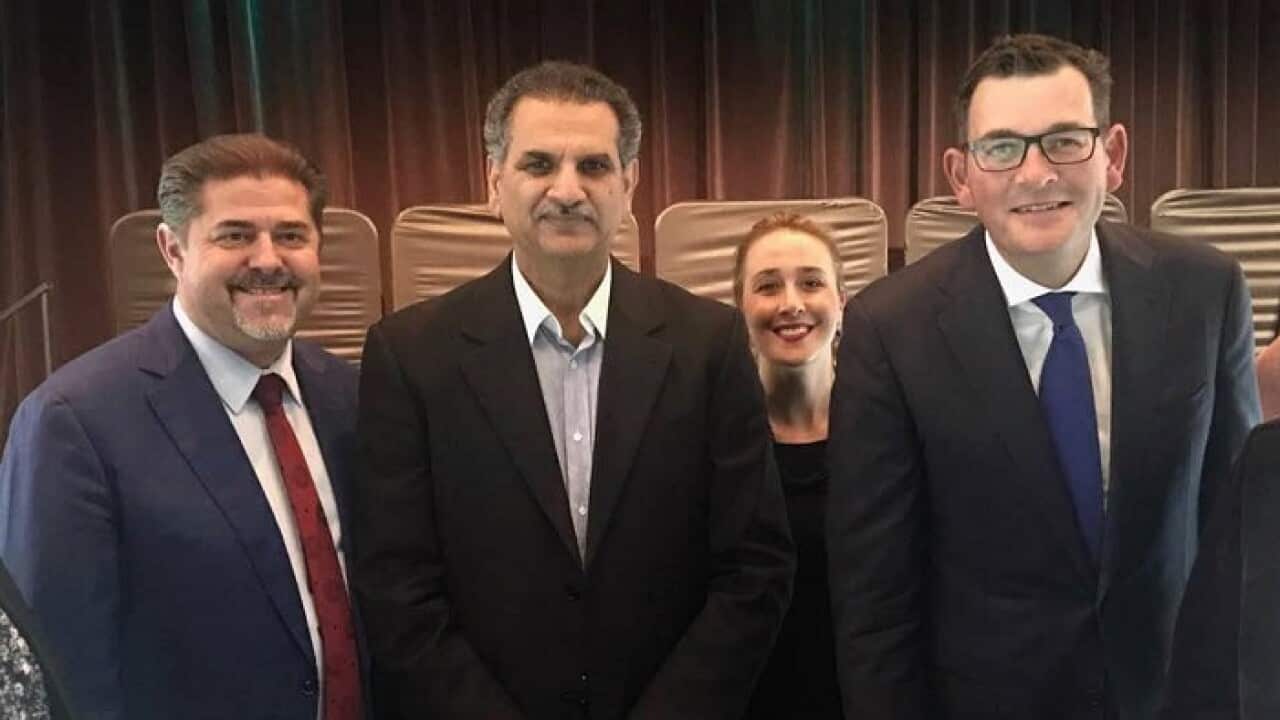 Dr Muhammad Shahbaz (centre) with Victorian Premier Daniel Andrews (right)