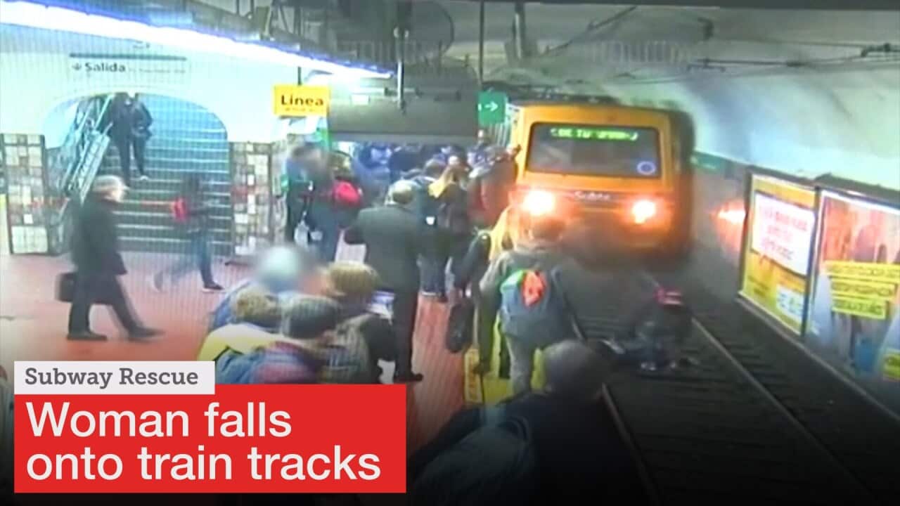 Commuters rescue woman from oncoming train