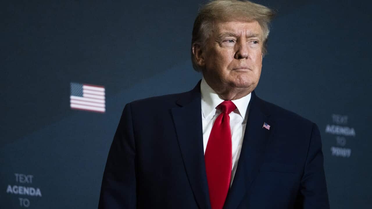 A man wearing a suit.