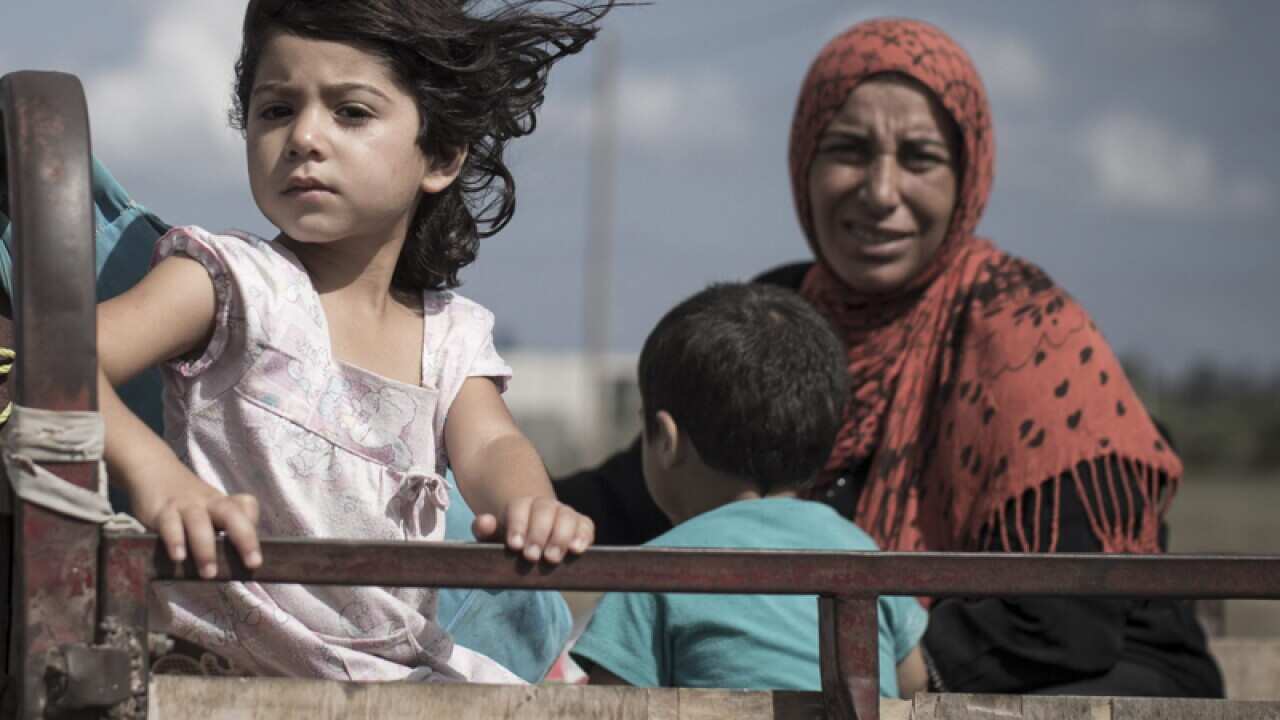 A Palestinian family who fled their homes from the Gaza Strip