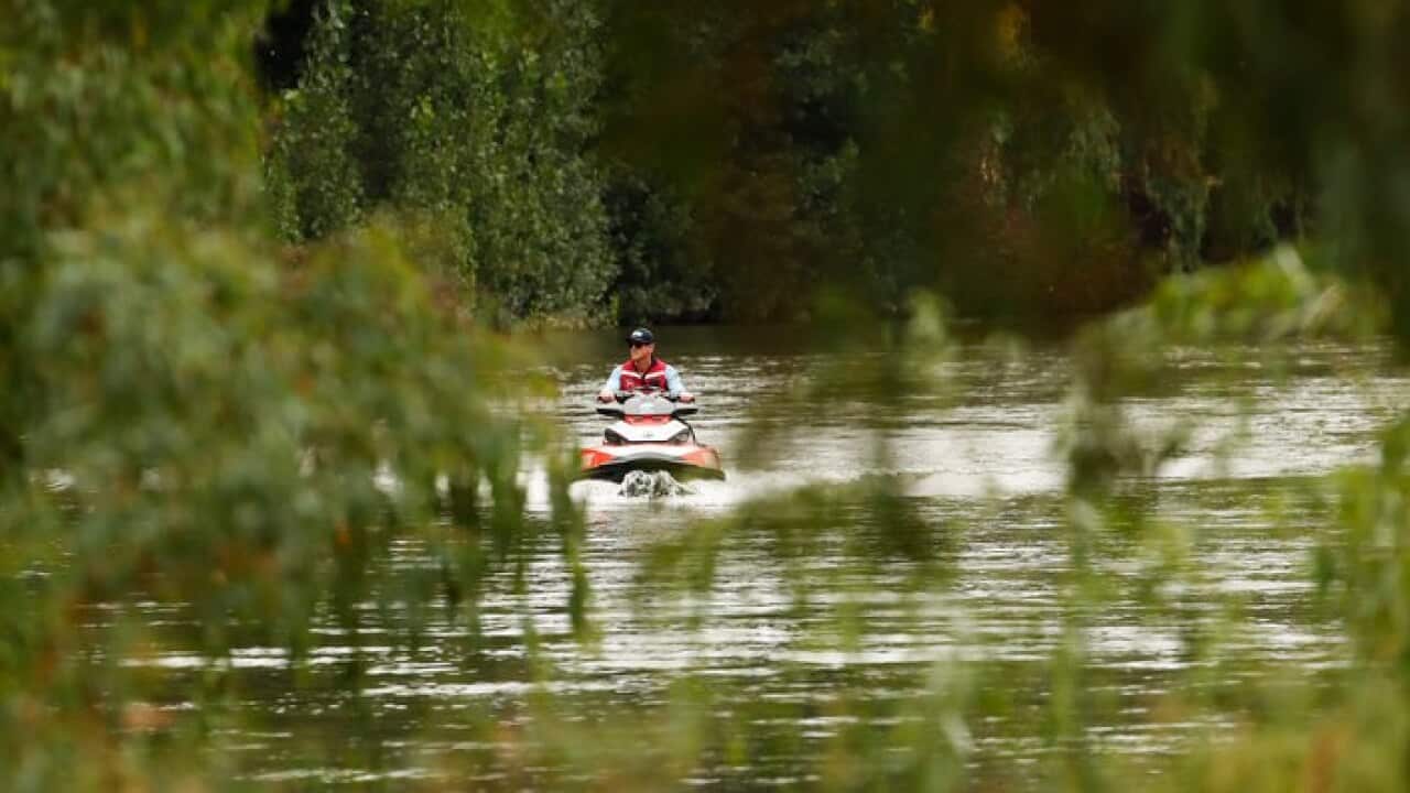 Searching for a missing swimmer in a river