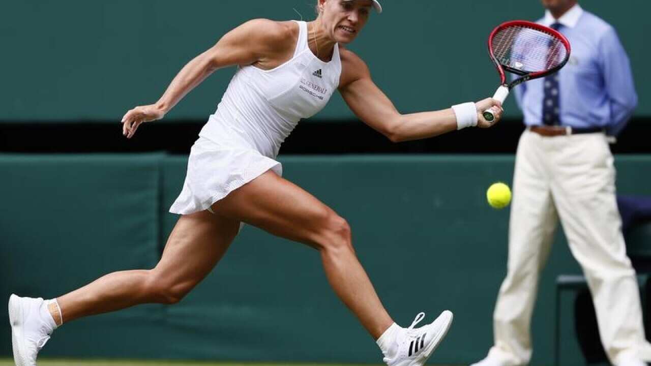 Angelique Kerber stretches for a forehand.