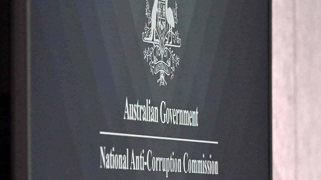 A sign that reads: "Australian Government: National Anti-Corruption Commission"