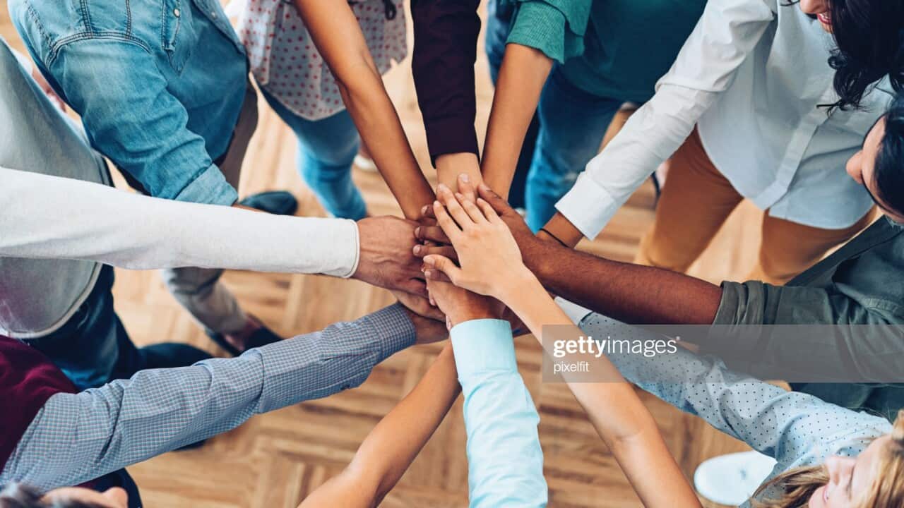 Large sea of hands