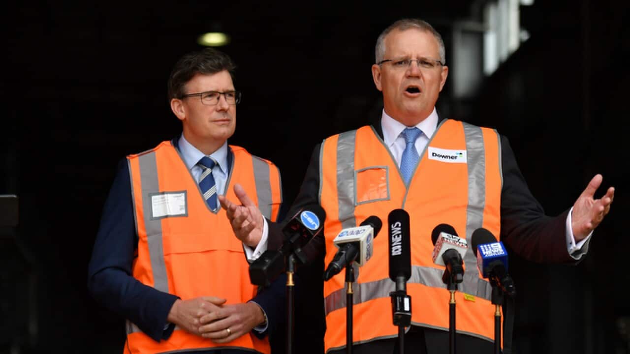 Minister for Cities Alan Tudge and Prime Minister Scott Morrison visits the Downer EDI Rail Auburn Maintenance Centre in Sydney, Tuesday, September 25, 2018. (AAP Image/Mick Tsikas) NO ARCHIVING