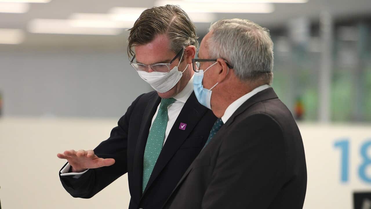 NSW Premier Dominic Perrottet speaks with Health Minister Brad Hazzard
