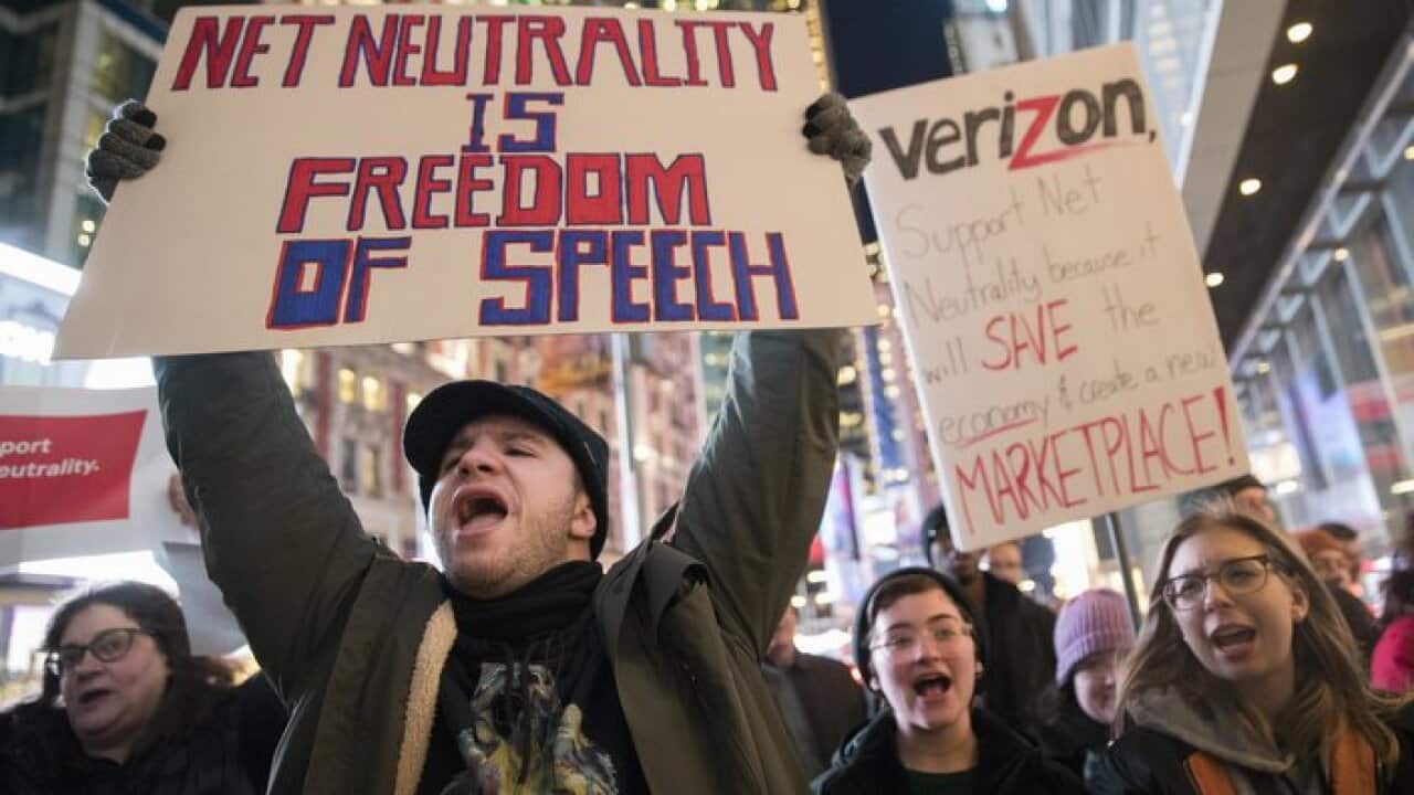 Rally in support of net neutrality outside a Verizon store in New York. The Federal Communications Commission is voting Thursday, Dec. 14