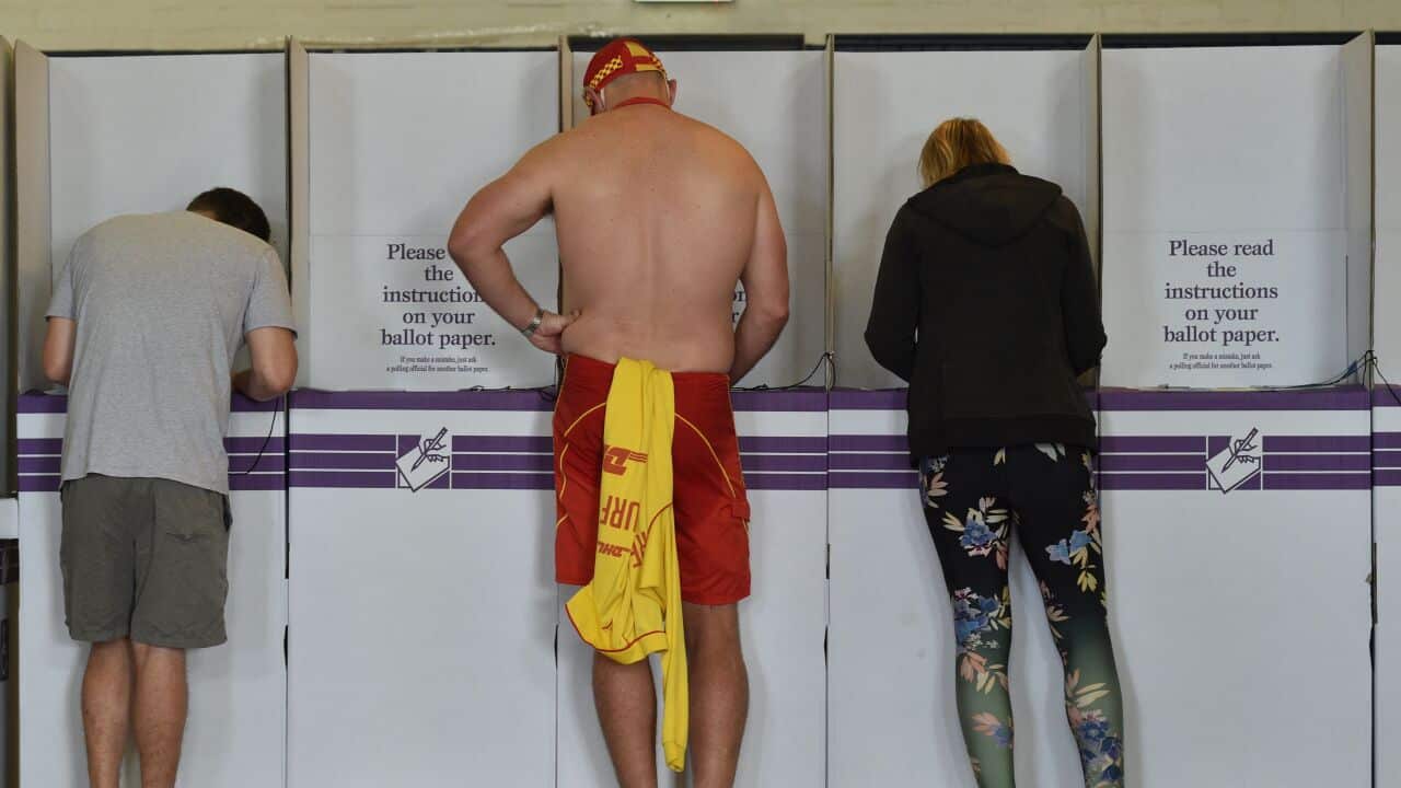 Australians voting on a ballot paper.