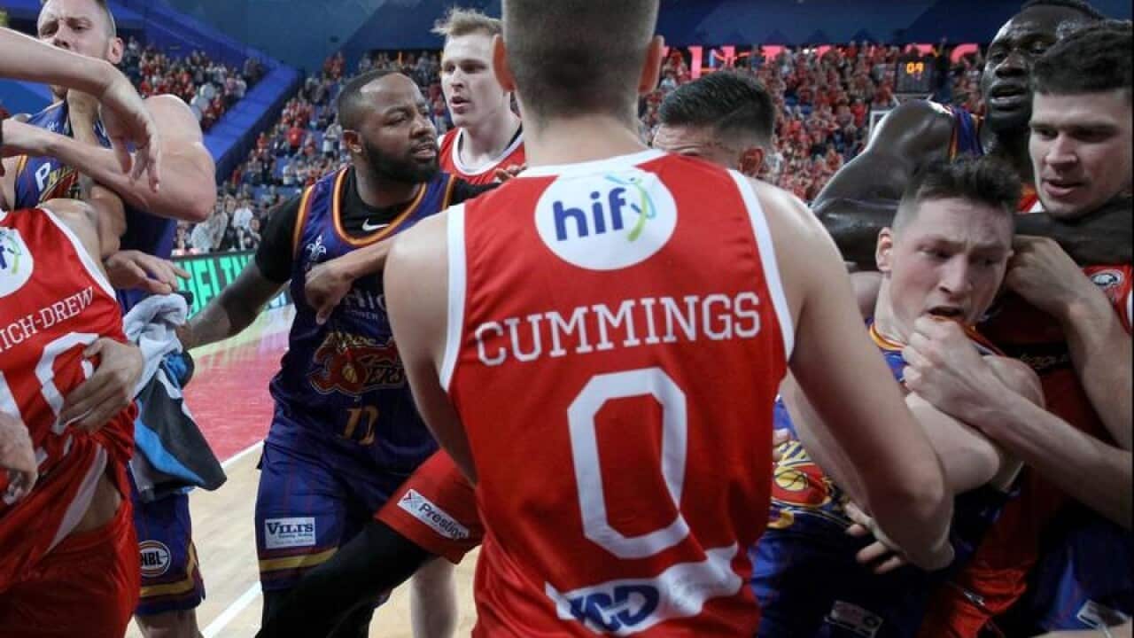 Wildcats and 36ers players in an NBL melee