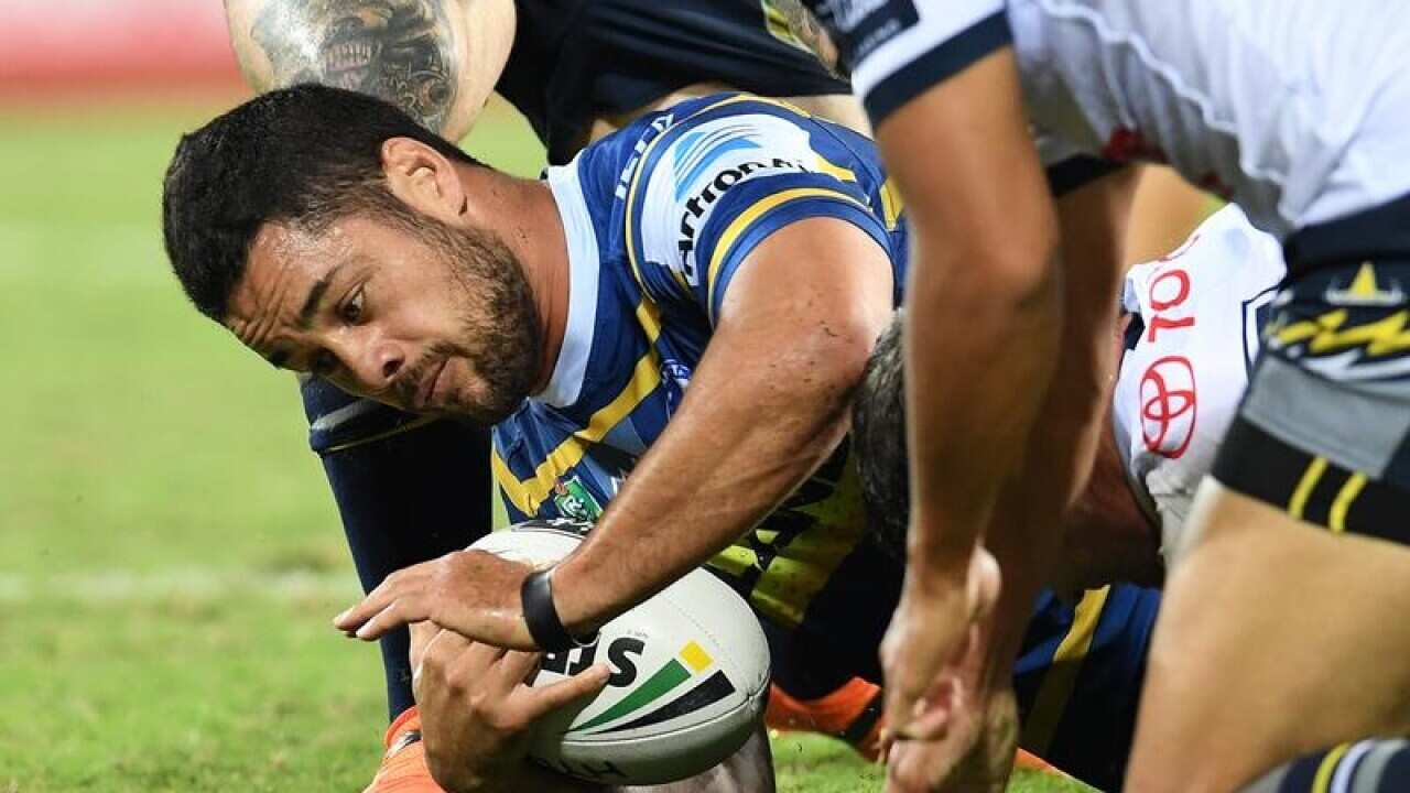 Jarryd Hayne of the Eels is tackled.