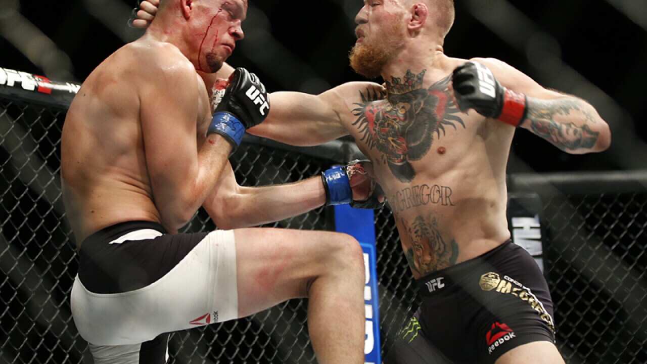 Conor McGregor (R) and Nate Diaz