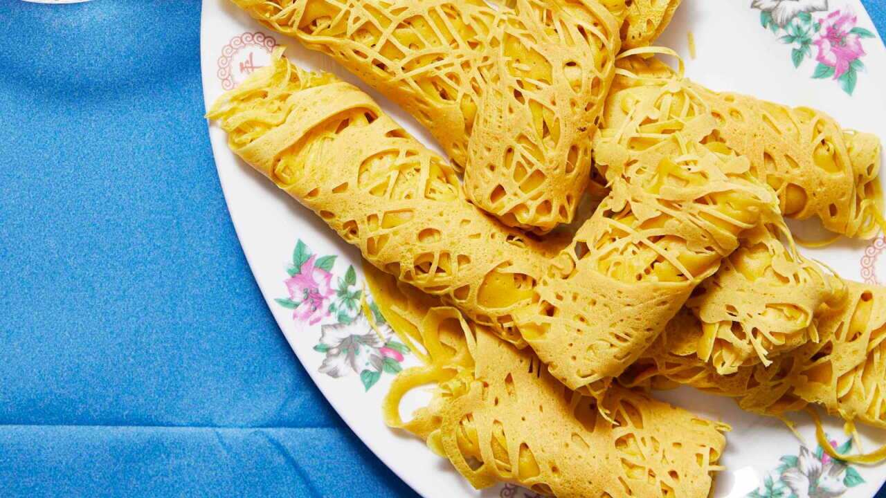 Pan Roti Jala Roti jala (Lacy pancakes) recipe | SBS Food | SBS Food