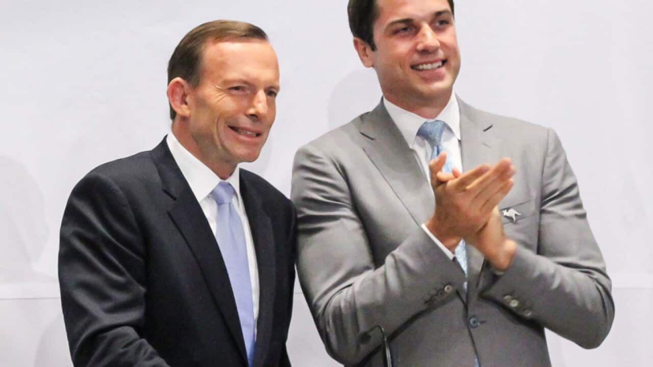 Prime Minister Tony Abbott (L)