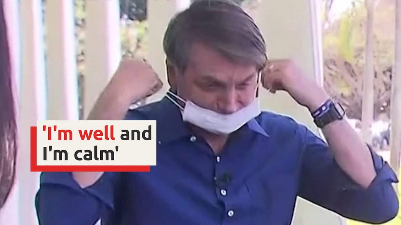 Jair Bolsonaro removes mask to assure media he's fine after testing positive for coronavirus