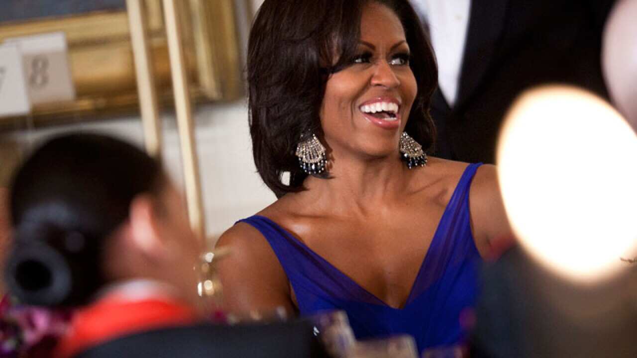 US First Lady Michelle Obama has used her position to fight childhood obesity, and is considered to be more popular than her husband, US President Barack Obama. (Getty)