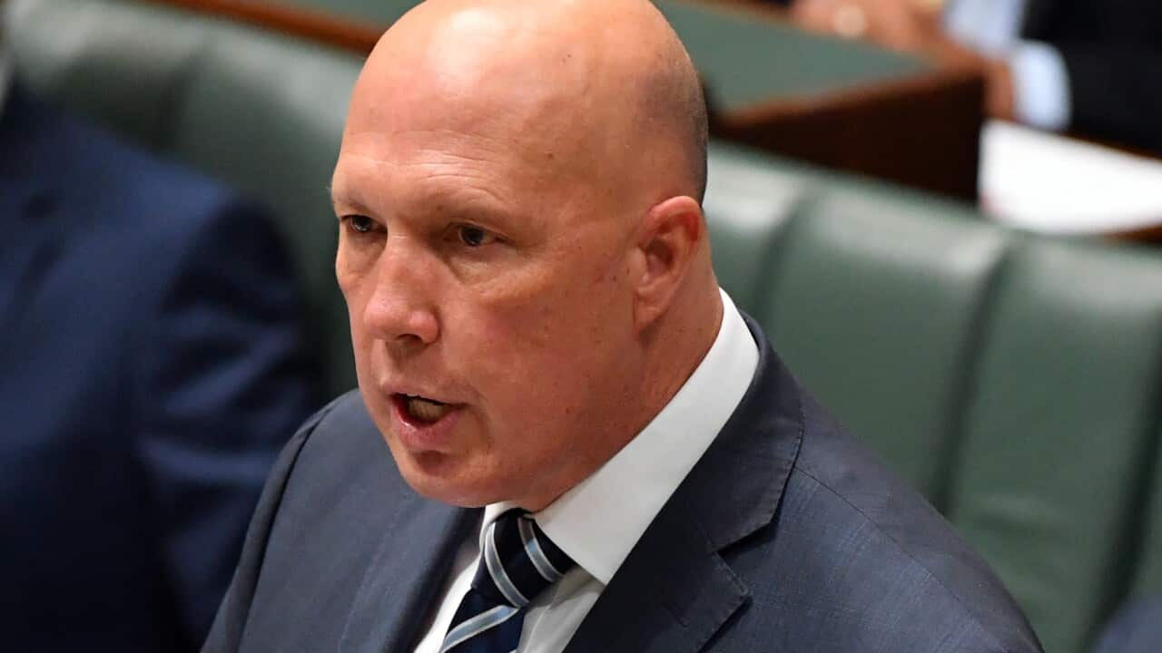 Defence Minister Peter Dutton is seen speaking in the House of Representatives.
