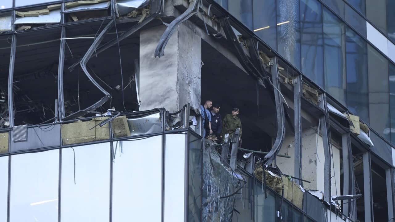 thumbnail_Investigators examine a damaged skyscraper in the Moscow City business district after a reported drone attack (AAP).jpg