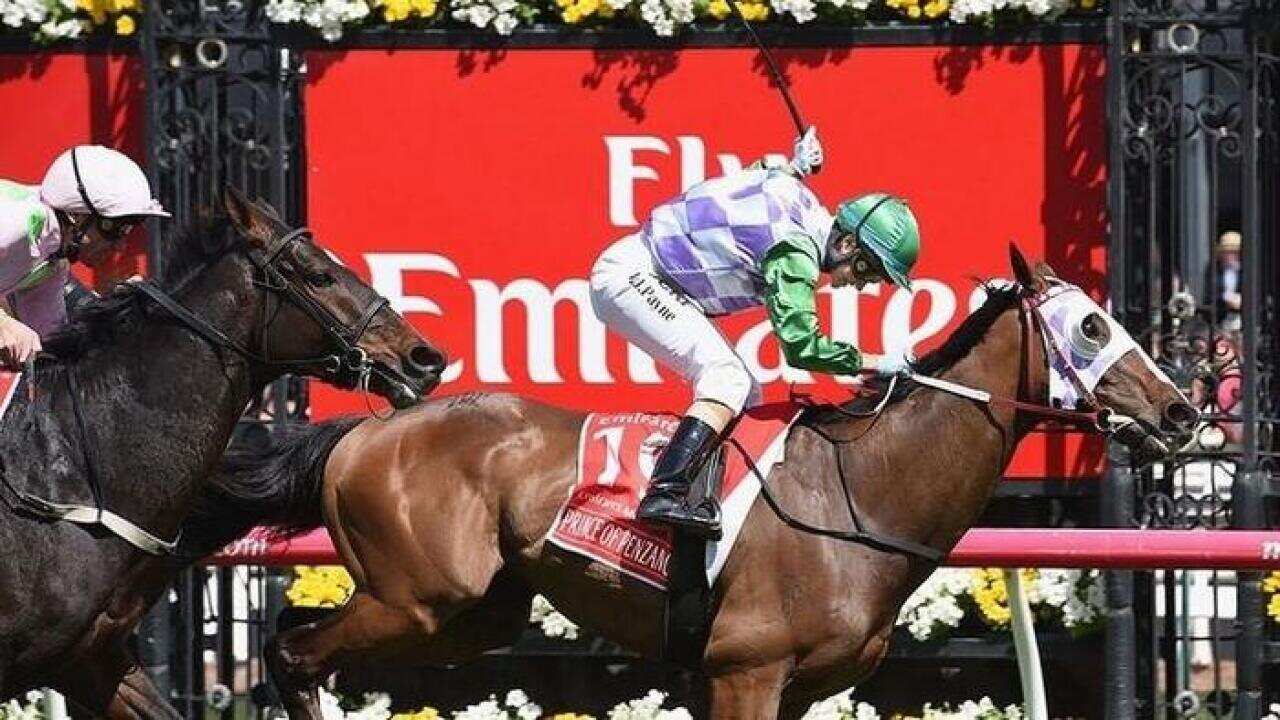 Michelle Payne celebrates her historic win on Prince of Penzance