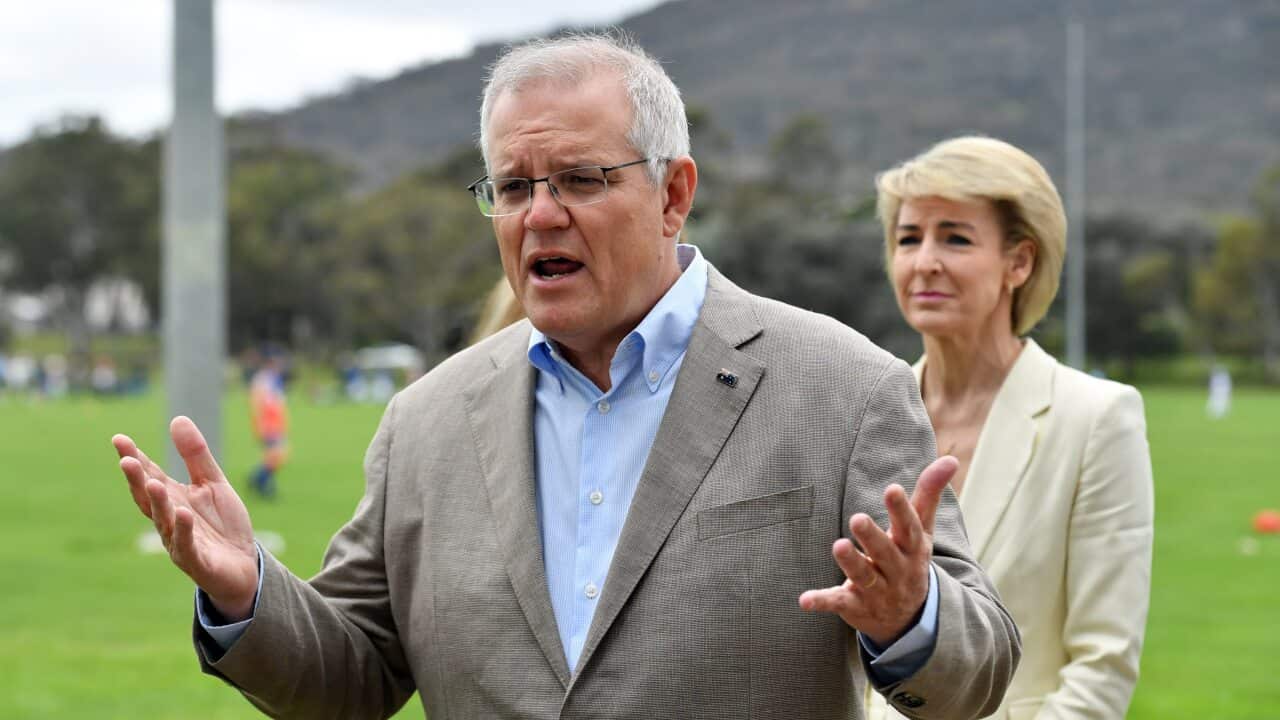 Prime Minister Scott Morrison and Attorney-General Michaelia Cash at a press conference during a visit the Kambah District Playing Fields in Canberra, Sunday, November 28, 2021.